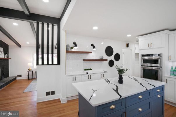 Fireplace, Interior, Kitchen, Recessed Lighting, Stainless Steel Appliances, Wooden Beams, Wood Texture Flooring
