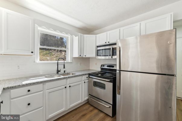 Interior, Kitchen, Stainless Steel Appliances, Wood Texture Flooring