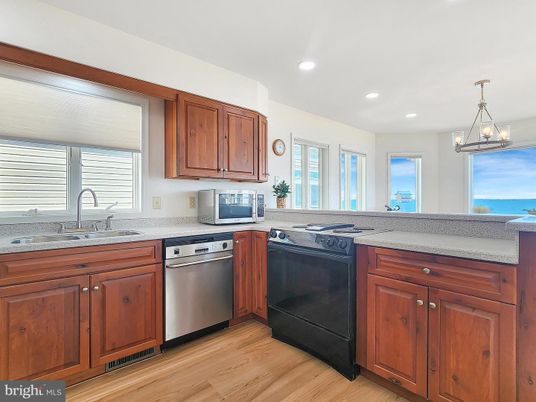 Interior, Kitchen, Pendant Lights, Recessed Lighting, Stainless Steel Appliances, Water, Wood Texture Flooring