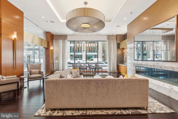 Fireplace, Interior, Living room, Pendant Lights, Recessed Lighting, Wood Texture Flooring, Wooden Walls