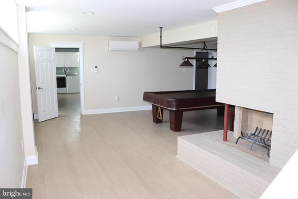 Billiard Table, Fireplace, Game Room, Interior, Pendant Lights, Recessed Lighting, Wood Texture Flooring