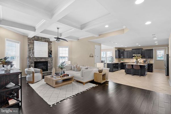 Fireplace, Interior, Kitchen, Living room, Recessed Lighting, Stone Walls, Wood Texture Flooring