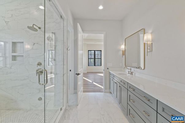 Bathroom, Dual Sink Vanities, Glass Shower, Interior, Marble, Marble Walls, Recessed Lighting