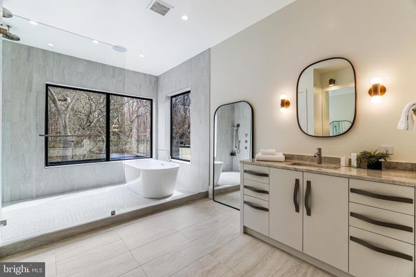 Bathroom, Dual Sink Vanities, Free Standing Baths, Interior, Recessed Lighting, Wood Texture Flooring