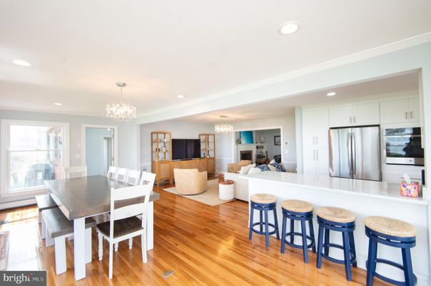 Chandelier, Dining room, Interior, Kitchen, Living room, Recessed Lighting, Stainless Steel Appliances, Wood Texture Flooring