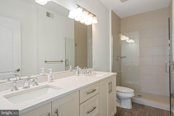 Bathroom, Dual Sink Vanities, Glass Shower, Interior, Wood Texture Flooring