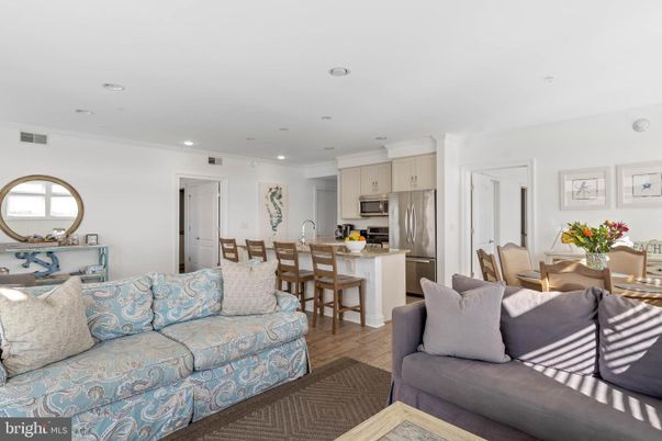 Dining room, Interior, Kitchen, Living room, Recessed Lighting, Stainless Steel Appliances, Wood Texture Flooring