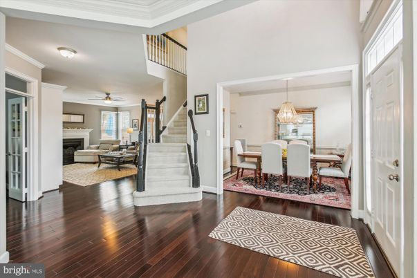 Chandelier, Dining room, Fireplace, Interior, Living room, Wood Texture Flooring