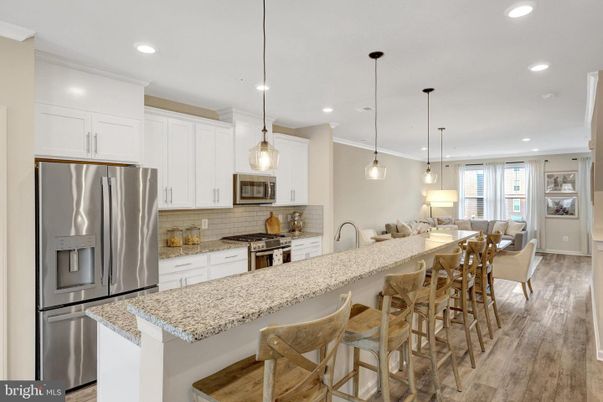 Dining room, Interior, Kitchen, Living room, Pendant Lights, Recessed Lighting, Stainless Steel Appliances, Wood Texture Flooring