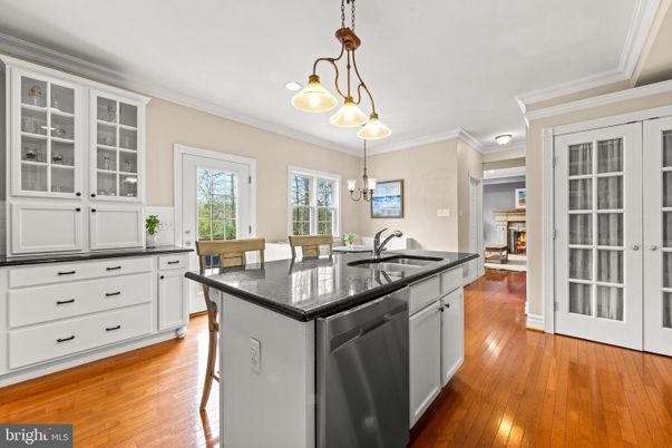 Dining room, Fireplace, Interior, Kitchen, Pendant Lights, Recessed Lighting, Wood Texture Flooring