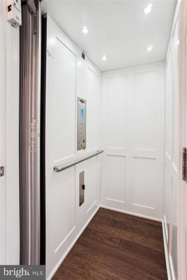 Elevator, Interior, Recessed Lighting, Wood Texture Flooring