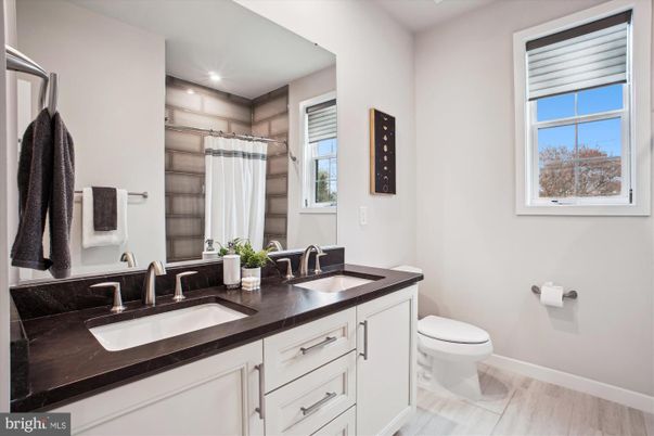 Bathroom, Dual Sink Vanities, Interior, Recessed Lighting, Wood Texture Flooring
