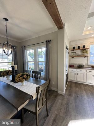 Dining room, Interior, Pendant Lights, Recessed Lighting, Wooden Beams, Wood Texture Flooring