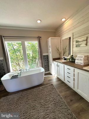 Bathroom, Dual Sink Vanities, Free Standing Baths, Interior, Recessed Lighting, Wood Texture Flooring