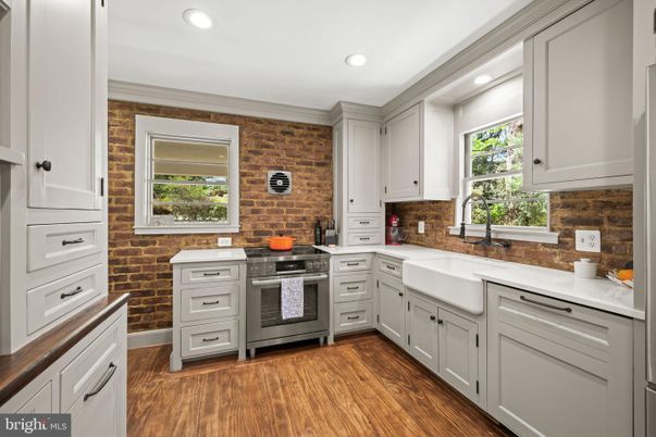 Interior, Kitchen, Recessed Lighting, Stainless Steel Appliances, Stone Walls, Wood Texture Flooring