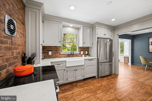 Interior, Kitchen, Recessed Lighting, Stainless Steel Appliances, Stone Walls, Wood Texture Flooring