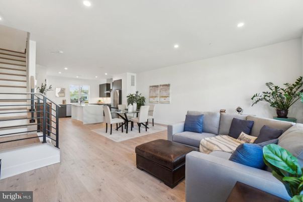 Dining room, Interior, Kitchen, Living room, Recessed Lighting, Stainless Steel Appliances, Wood Texture Flooring