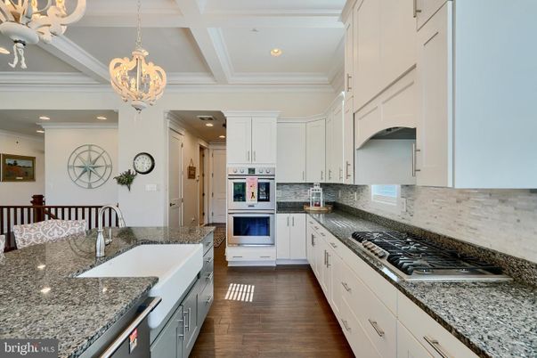Chandelier, Interior, Kitchen, Pendant Lights, Recessed Lighting, Stainless Steel Appliances, Wood Texture Flooring
