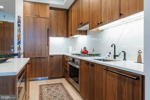 Interior, Kitchen, Marble Walls, Recessed Lighting, Wood Texture Flooring