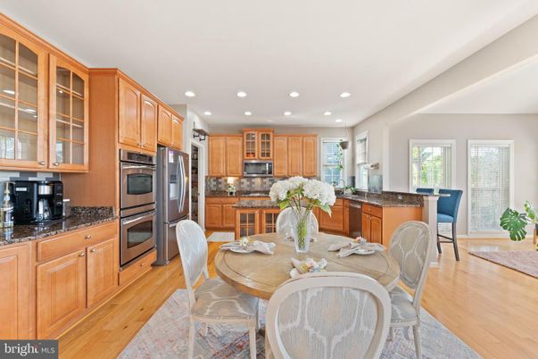Dining room, Interior, Kitchen, Recessed Lighting, Stainless Steel Appliances, Wood Texture Flooring