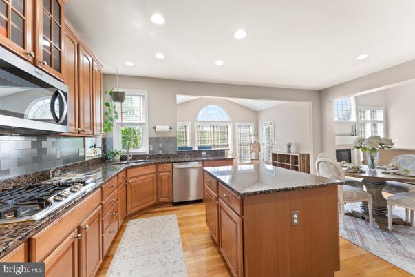 Dining room, Interior, Kitchen, Recessed Lighting, Stainless Steel Appliances, Wood Texture Flooring