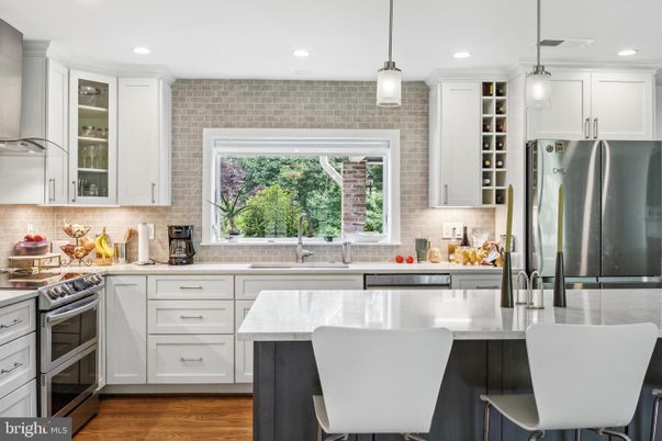 Interior, Kitchen, Pendant Lights, Recessed Lighting, Stainless Steel Appliances, Stone Walls, Wood Texture Flooring