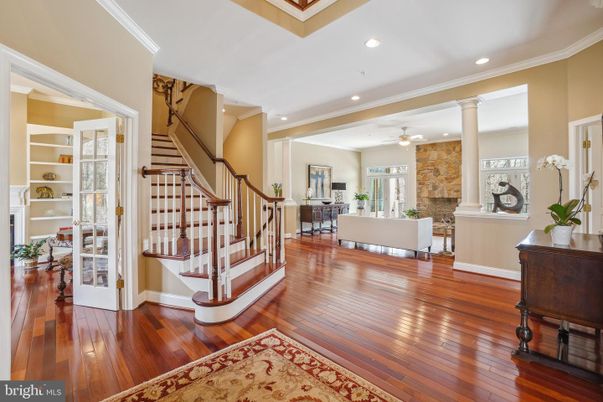 Fireplace, Interior, Living room, Recessed Lighting, Stone Walls, Wood Texture Flooring