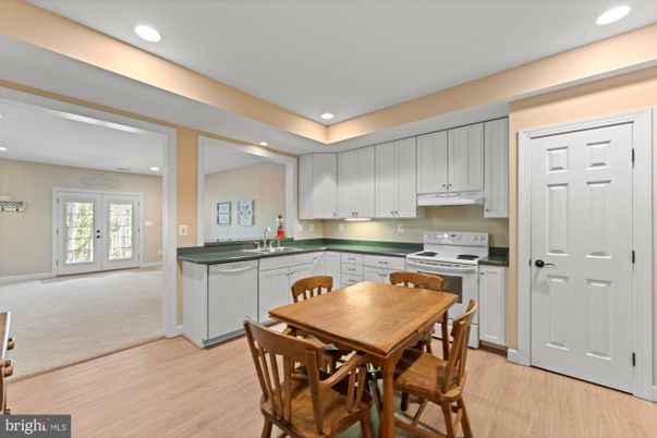 Dining room, Interior, Kitchen, Recessed Lighting, Stainless Steel Appliances, Wood Texture Flooring