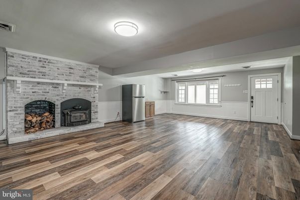 Empty room, Fireplace, Interior, Stone Walls, Wood Texture Flooring