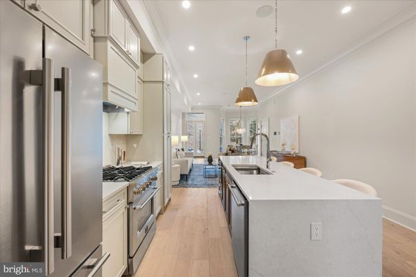 Dining room, Interior, Kitchen, Living room, Pendant Lights, Recessed Lighting, Stainless Steel Appliances, Wood Texture Flooring