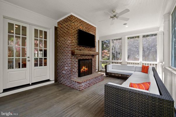 Fireplace, Interior, Living room, Recessed Lighting, Stone Walls, Wood Texture Flooring