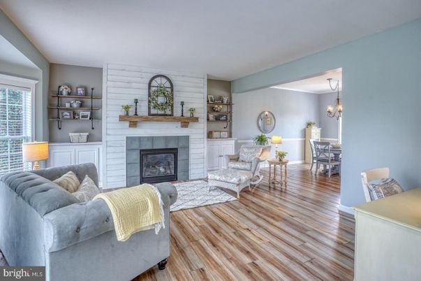 Dining room, Fireplace, Interior, Living room, Pendant Lights, Stone Walls, Wood Texture Flooring