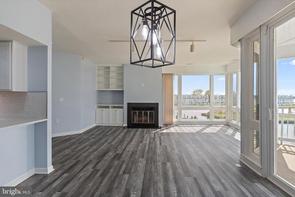 Empty room, Fireplace, Interior, Pendant Lights, Wood Texture Flooring