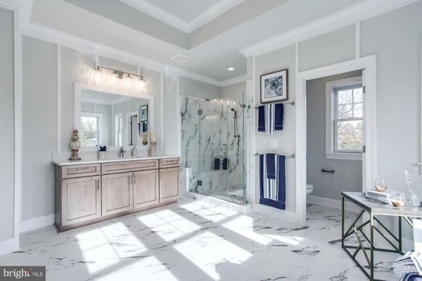 Bathroom, Dual Sink Vanities, Glass Shower, Interior, Marble, Marble Walls, Recessed Lighting