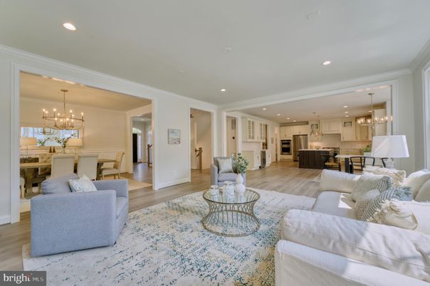 Chandelier, Dining room, Interior, Kitchen, Living room, Pendant Lights, Recessed Lighting, Stainless Steel Appliances, Wood Texture Flooring