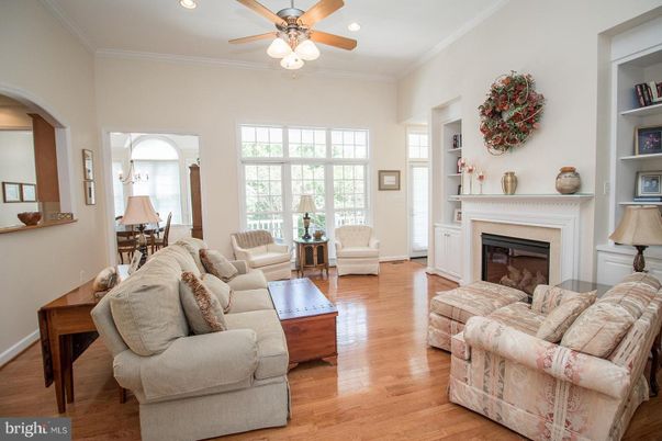 Dining room, Fireplace, Interior, Living room, Recessed Lighting, Wood Texture Flooring