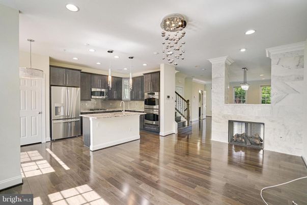 Fireplace, Interior, Kitchen, Pendant Lights, Recessed Lighting, Stainless Steel Appliances, Wood Texture Flooring