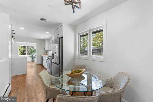 Dining room, Interior, Kitchen, Pendant Lights, Recessed Lighting, Stainless Steel Appliances, Wood Texture Flooring