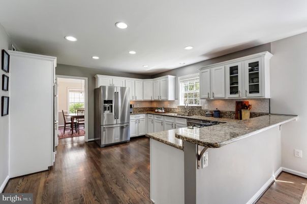 Dining room, Interior, Kitchen, Recessed Lighting, Stainless Steel Appliances, Wood Texture Flooring