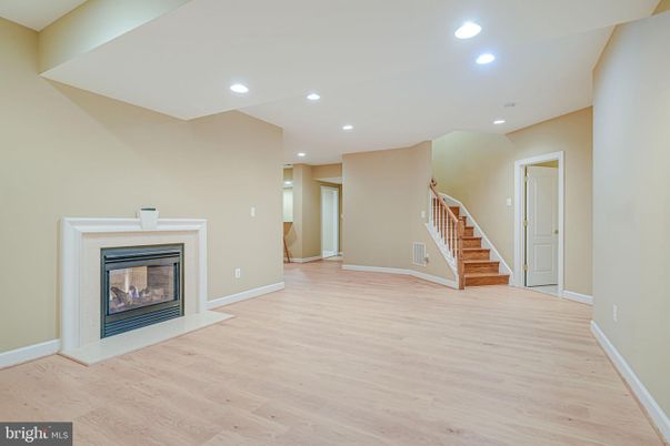Empty room, Fireplace, Interior, Recessed Lighting, Wood Texture Flooring