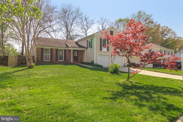 Attached, Backyard, Exterior, Facade, Brick Facade, Split Level