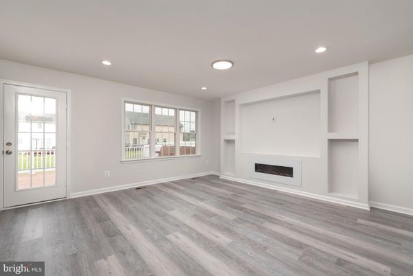 Empty room, Fireplace, Interior, Recessed Lighting, Wood Texture Flooring