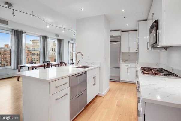 Dining room, Interior, Kitchen, Recessed Lighting, Stainless Steel Appliances, Wood Texture Flooring
