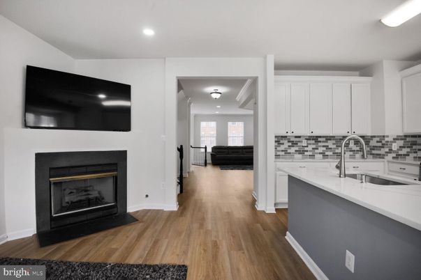 Fireplace, Interior, Kitchen, Recessed Lighting, Wood Texture Flooring