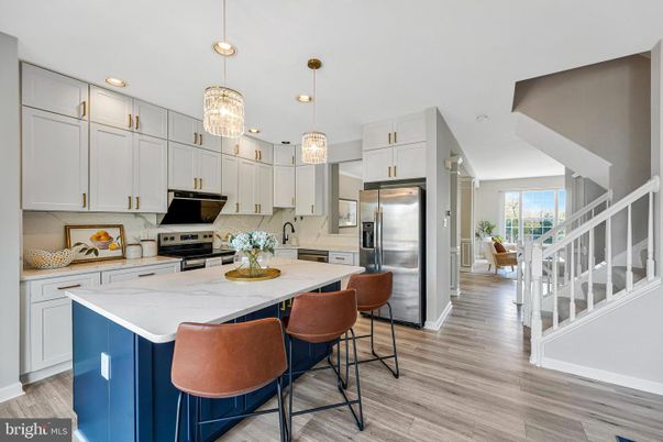 Chandelier, Interior, Kitchen, Pendant Lights, Recessed Lighting, Stainless Steel Appliances, Wood Texture Flooring