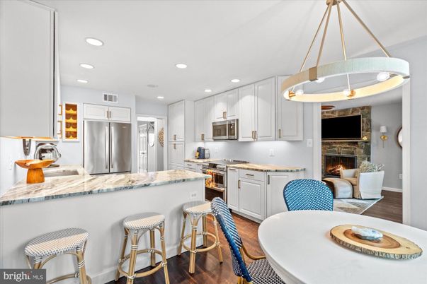 Fireplace, Interior, Kitchen, Pendant Lights, Recessed Lighting, Stainless Steel Appliances, Wood Texture Flooring