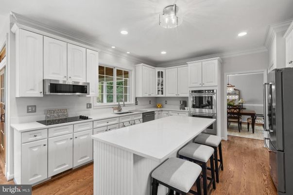 Dining room, Interior, Kitchen, Recessed Lighting, Stainless Steel Appliances, Wood Texture Flooring