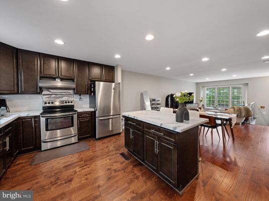 Dining room, Interior, Kitchen, Living room, Recessed Lighting, Stainless Steel Appliances, Wood Texture Flooring