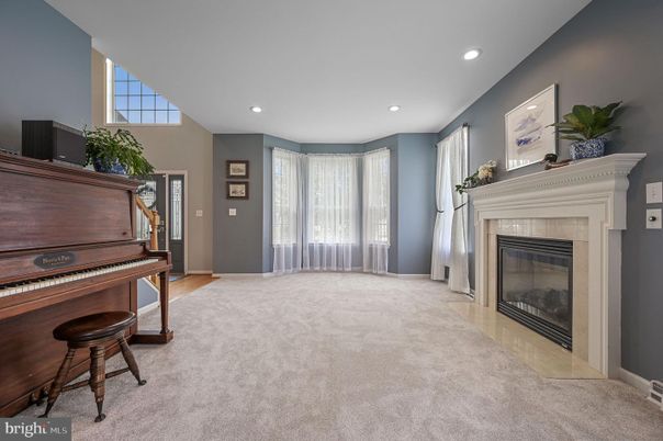 Fireplace, Interior, Piano, Recessed Lighting, Wood Texture Flooring