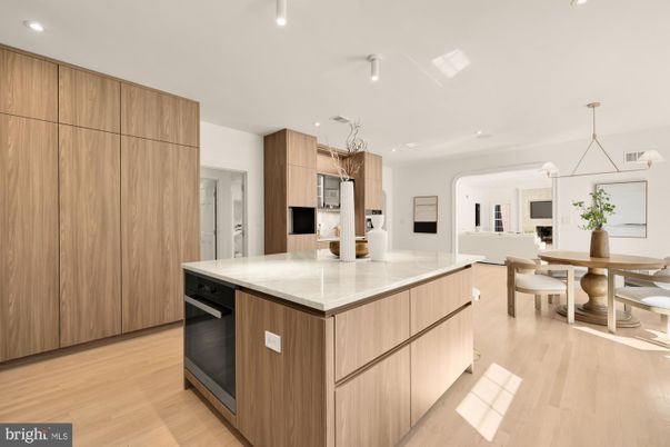 Chandelier, Dining room, Interior, Kitchen, Pendant Lights, Recessed Lighting, Stainless Steel Appliances, Wood Texture Flooring